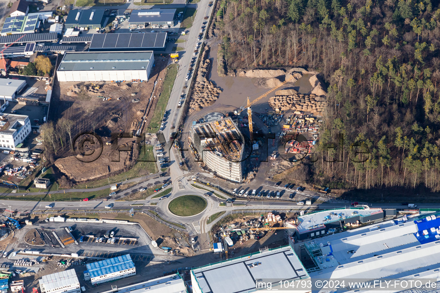 Agrandissement - nouveau bâtiment - chantier des bâtiments et halls de production de l'usine SEW-EURODRIVE GmbH & Co KG à le quartier Graben in Graben-Neudorf dans le département Bade-Wurtemberg, Allemagne depuis l'avion