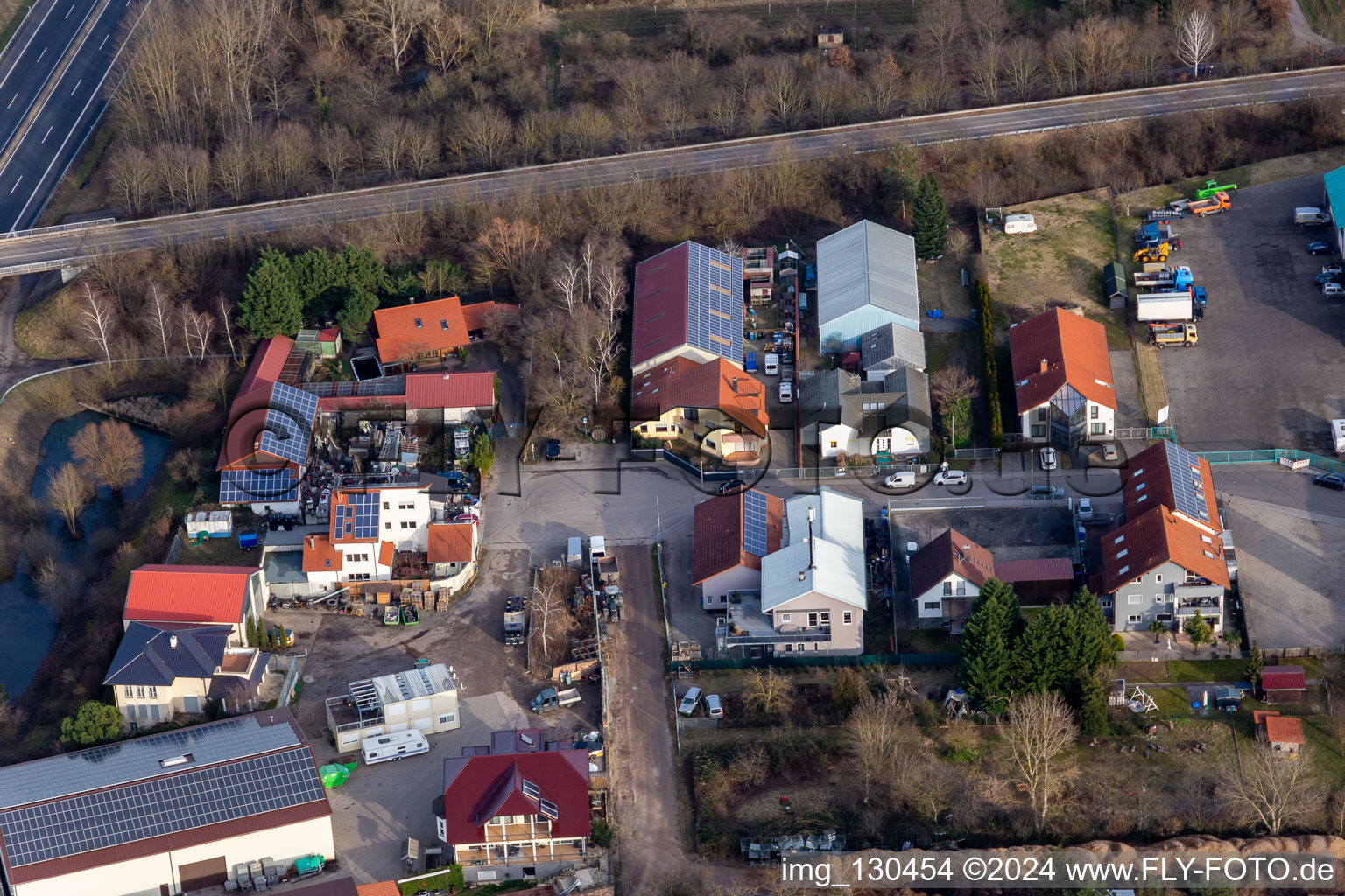 Vue aérienne de Zone commerciale In der Nauroth, Harry Anton construction de plomberie et de chauffage à Ellerstadt dans le département Rhénanie-Palatinat, Allemagne