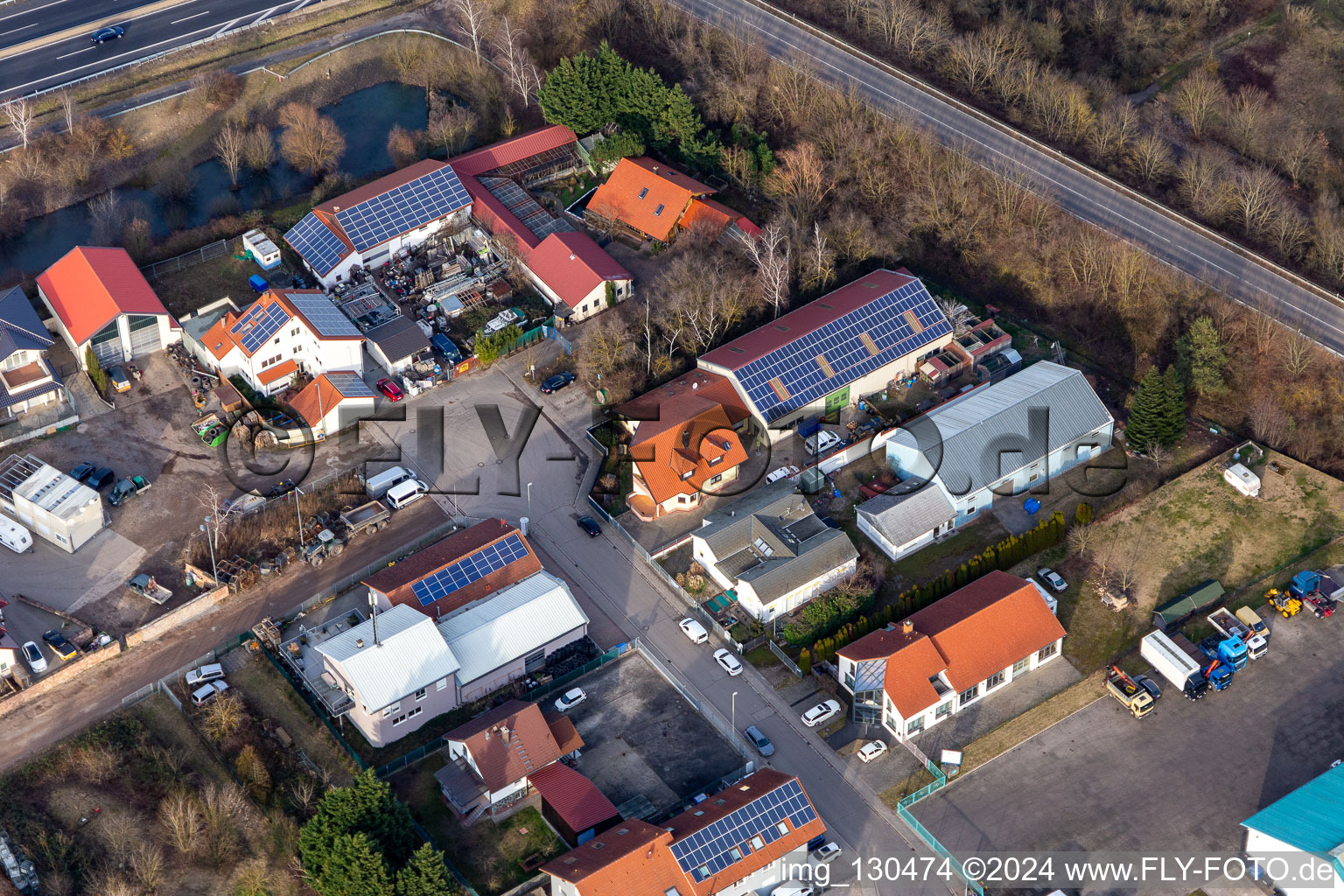 Photographie aérienne de Zone commerciale In der Nauroth, Harry Anton construction de plomberie et de chauffage à Ellerstadt dans le département Rhénanie-Palatinat, Allemagne