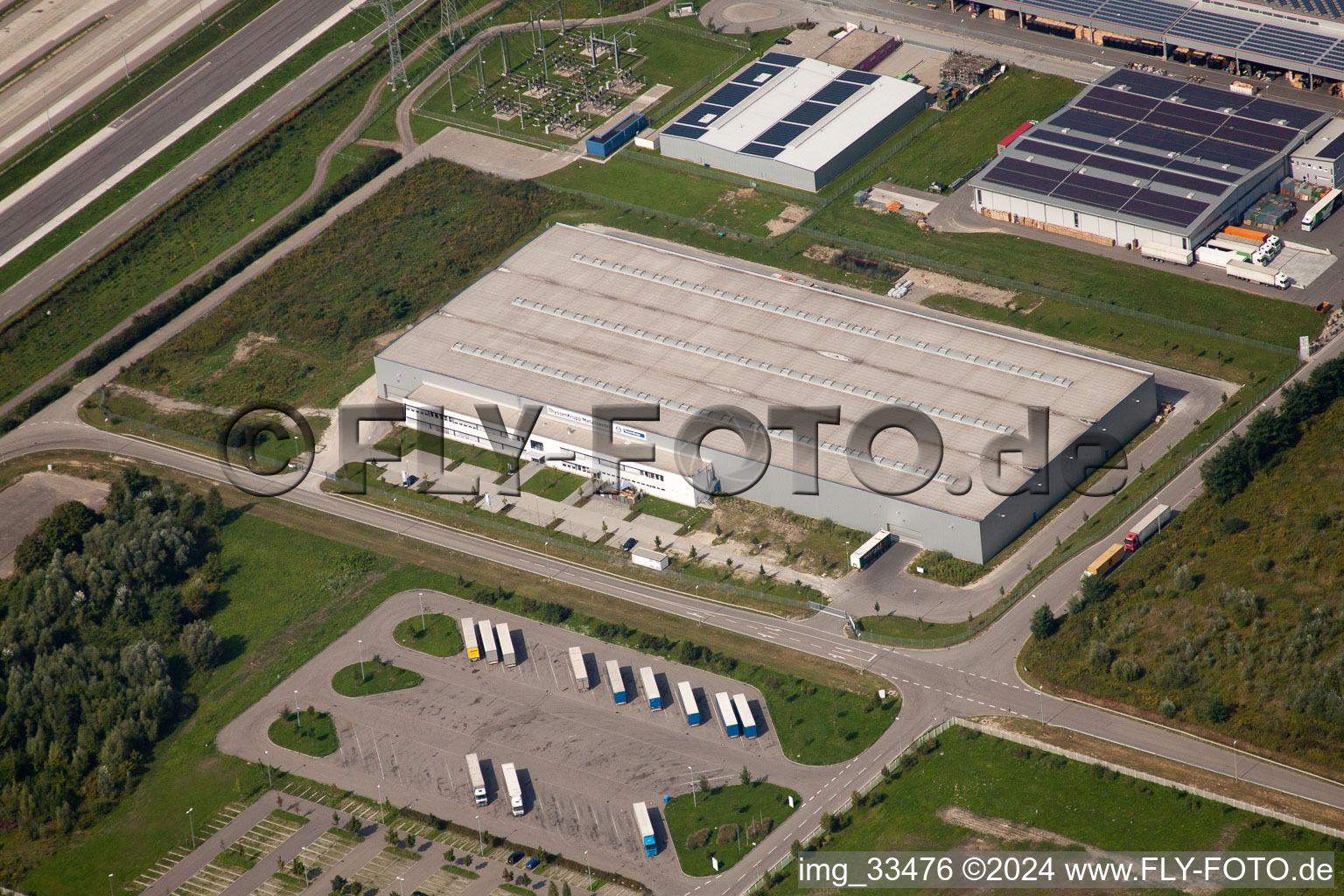 Photographie aérienne de Zone industrielle d'Oberwald, entreprises de logistique à le quartier Maximiliansau in Wörth am Rhein dans le département Rhénanie-Palatinat, Allemagne