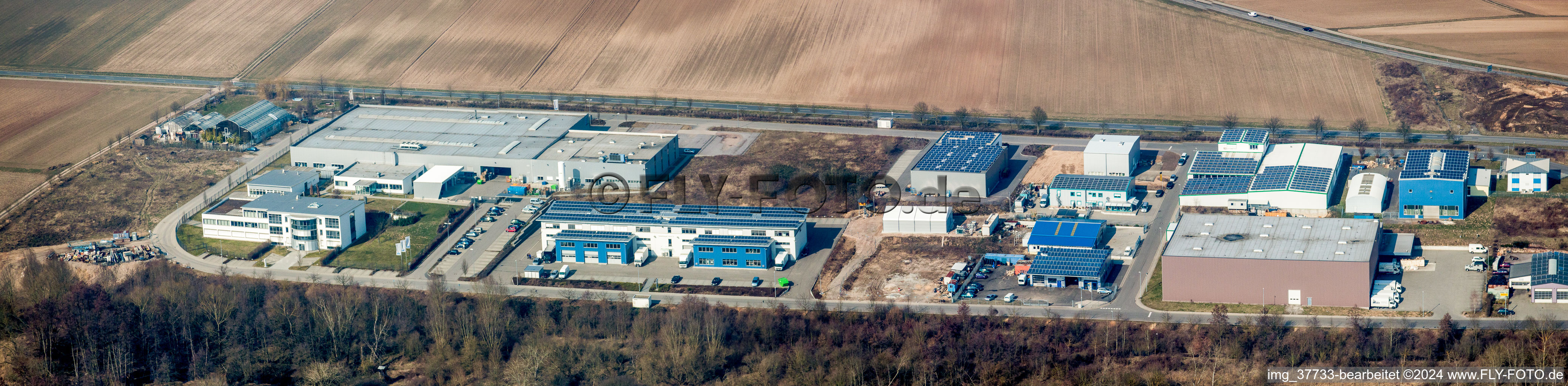 Vue aérienne de Perspective panoramique zone commerciale et implantation d'entreprises Ouest (Palatinat) à le quartier Herxheim in Herxheim bei Landau dans le département Rhénanie-Palatinat, Allemagne