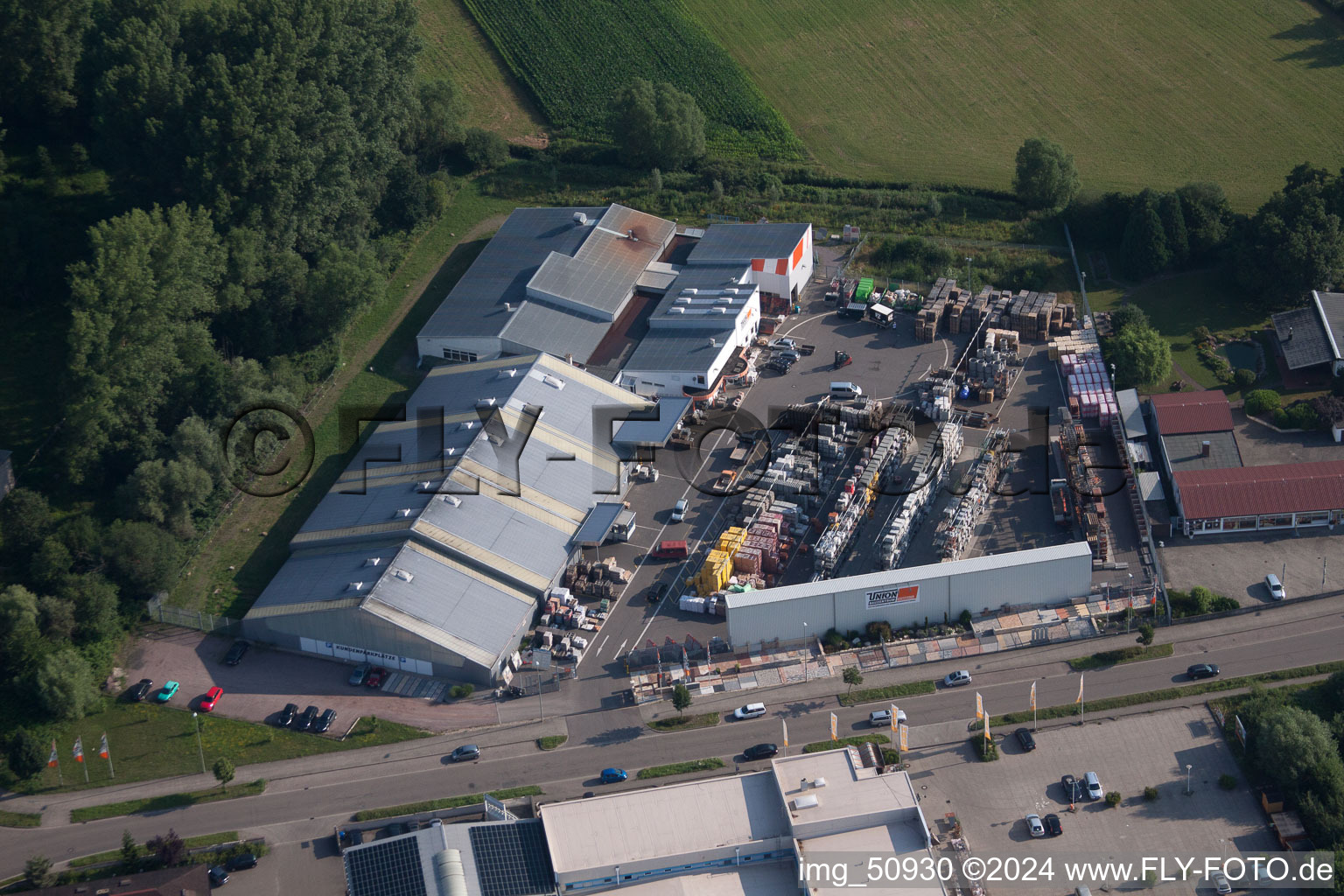 Vue aérienne de Zone industrielle de Horst, Union Bauzentrum à le quartier Minderslachen in Kandel dans le département Rhénanie-Palatinat, Allemagne