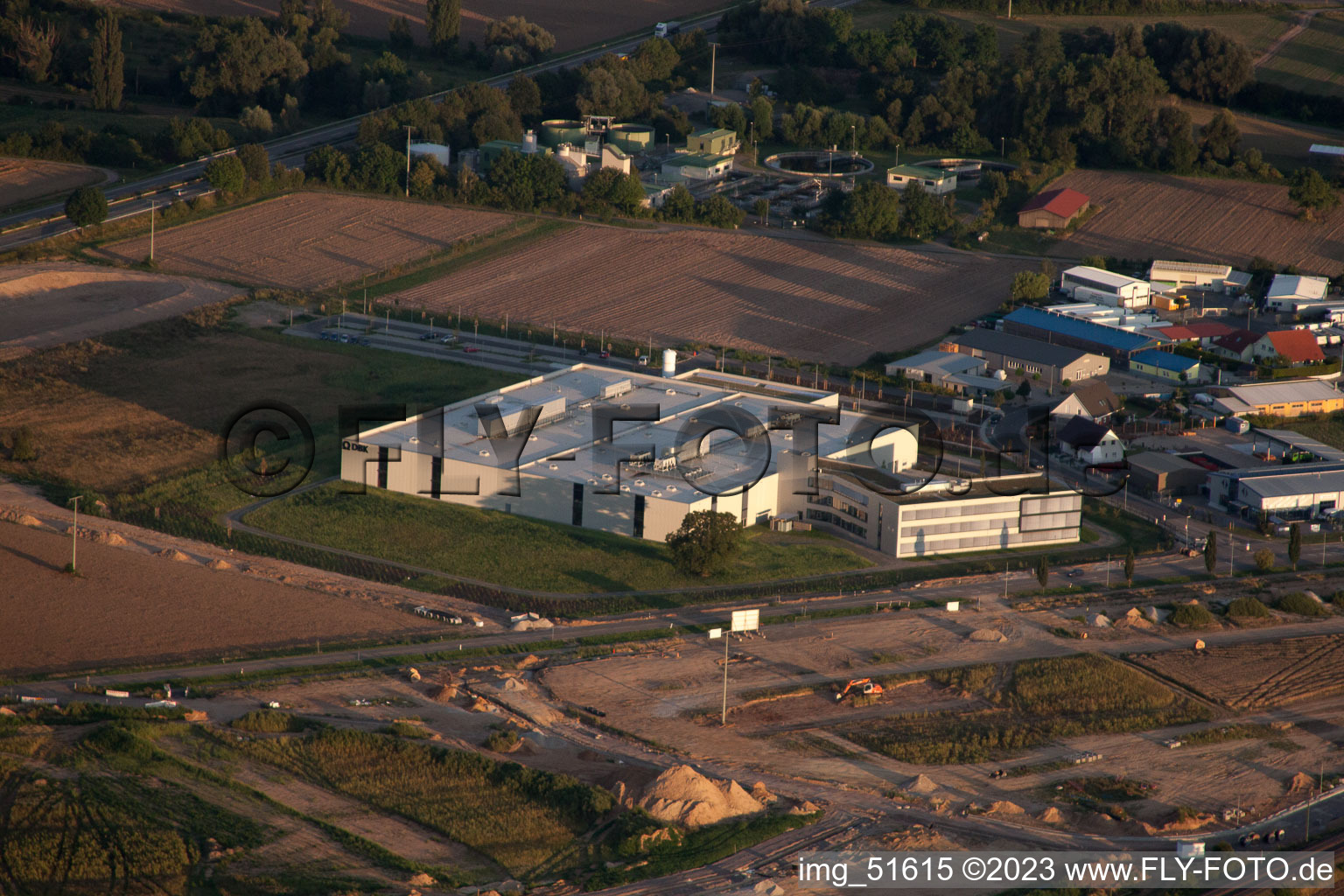 Photographie aérienne de Zone commerciale Nord, nouveau bâtiment DBK à Rülzheim dans le département Rhénanie-Palatinat, Allemagne