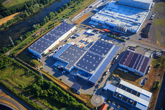 Photographie aérienne de Zone industrielle d'Oberwald avec SKA Sitze GmbH, WAS Logistics, Com Transporte GmbH et le groupe NUSS à Wörth am Rhein dans le département Rhénanie-Palatinat, Allemagne