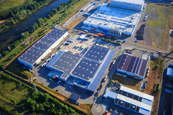 Vue oblique de Zone industrielle d'Oberwald avec SKA Sitze GmbH, WAS Logistics, Com Transporte GmbH et le groupe NUSS à Wörth am Rhein dans le département Rhénanie-Palatinat, Allemagne