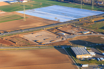 Vue aérienne de Zone industrielle Carl-Benz-Straße avec terrain à bâtir pour le nouveau bâtiment de FISCHER et EIZO GmbH à Rülzheim dans le département Rhénanie-Palatinat, Allemagne