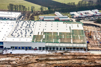Construction d'un nouveau hall logistique dans la zone industrielle d'Am Horst à le quartier Minderslachen in Kandel dans le département Rhénanie-Palatinat, Allemagne hors des airs