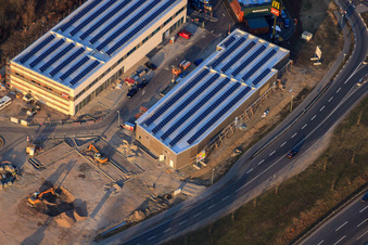 Vue oblique de Centre Maximilien II avec chantier de construction pour DM et Sport Fink à le quartier Maximiliansau in Wörth am Rhein dans le département Rhénanie-Palatinat, Allemagne
