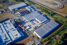 Zone industrielle d'Oberwald avec SKA Sitze GmbH, WAS Logistics, Com Transporte GmbH et le groupe NUSS à Wörth am Rhein dans le département Rhénanie-Palatinat, Allemagne vue d'en haut
