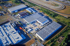 Zone industrielle d'Oberwald avec SKA Sitze GmbH, WAS Logistics, Com Transporte GmbH et le groupe NUSS à Wörth am Rhein dans le département Rhénanie-Palatinat, Allemagne depuis l'avion