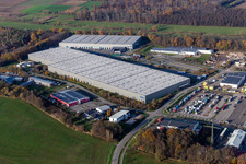 Vue aérienne de Zone commerciale de Horst et création d'une entreprise avec Friedrich random GmbH & Co. KG Internationale Spedition, Magna Outsides, STS Group et Thermo Fisher à le quartier Minderslachen in Kandel dans le département Rhénanie-Palatinat, Allemagne