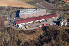 Vue aérienne de Zone commerciale et établissement d'entreprise, parc commercial W 1 avec société de transport NUSS et magasin de meubles Weber (Palatinat) à le quartier Herxheim in Herxheim bei Landau dans le département Rhénanie-Palatinat, Allemagne