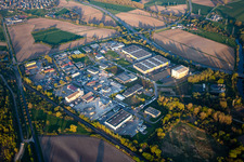 Vue aérienne de Zone industrielle et commerciale Zone industrielle du Ried à Herrlisheim dans le département Bas Rhin, France