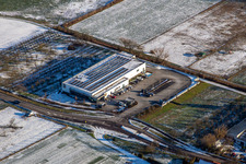 Vue aérienne de Aldi en hiver quand il y a de la neige à Schweighofen dans le département Rhénanie-Palatinat, Allemagne