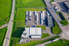 Vue oblique de Zone industrielle avec KIMMEL LOGISTICS, KIMMEL LAVAGE, Dietrich Véhicules et Sarre Union Pl Services - MAN au péage de Sarre-Union - A4 - Route n°42 à Thal-Drulingen dans le département Bas Rhin, France