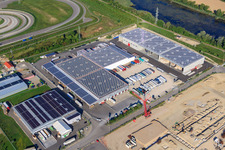 Photographie aérienne de Halls et camions du groupe NUSS dans la zone industrielle d'Oberwald à Wörth am Rhein dans le département Rhénanie-Palatinat, Allemagne